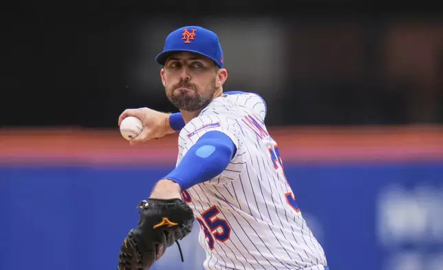 New York Mets' Clay Holmes pitches during the second inning in the first baseball game of a doubleheader against the Milwaukee Brewers Wednesday, July 2, 2025, in New York. (AP Photo/Frank Franklin II)