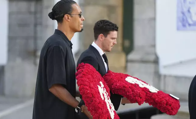 Dutch player Virgil Van Dijk, captain of Liverpool, walks to the church to attend the funeral of his teammate Diogo Jota and his brother André Silva, in Gondomar, near Porto, Portugal, on Saturday, July 5, 2025. (AP Photo/Manu Fernandez)