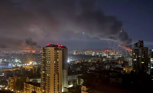 Smoke rises after a Russian strike on Kyiv, Ukraine, on Friday, July 4, 2025. (AP Photo/Yehor Konovalov)