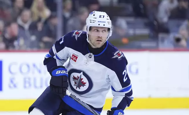 FILE - Winnipeg Jets' Nikolaj Ehlers plays during an NHL hockey game, Thursday, in Philadelphia. (AP Photo/Matt Slocum, File)