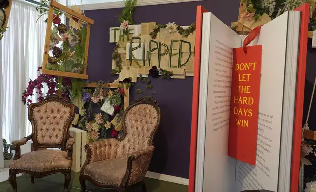An oversized bookmark is featured in a display at The Ripped Bodice bookstore in Culver City, Calif., on Thursday, July 3, 2025. (AP Photo/Chris Pizzello)