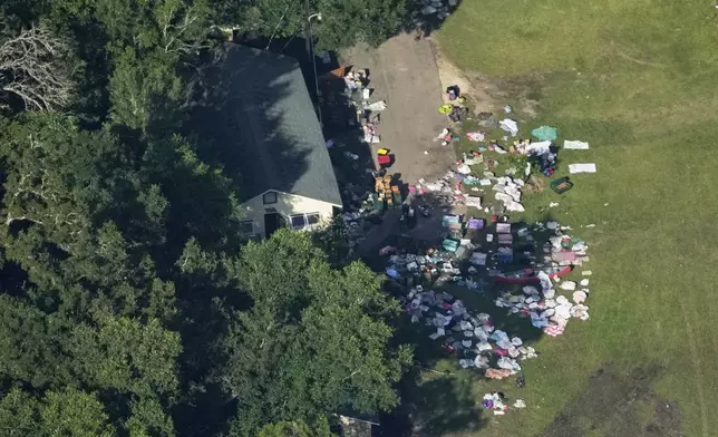 This aerial photo shows damage to Camp Mystic from flash floods along the Guadalupe River in Hunt, Texas, Thursday, July 10, 2025. (AP Photo/Gerald Herbert)