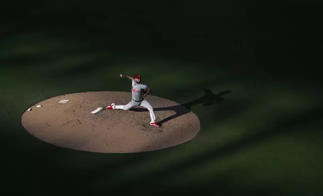 Philadelphia Phillies starting pitcher Zack Wheeler works against a San Diego Padres batter during the fifth inning of a baseball game Saturday, July 12, 2025, in San Diego. (AP Photo/Orlando Ramirez)