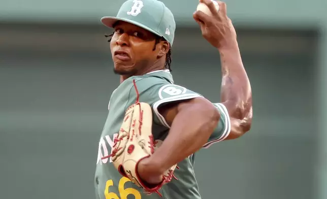 Boston Red Sox pitcher Brayan Bello throws during the first inning of a baseball game against the Los Angeles Dodgers, Friday, July 25, 2025, in Boston. (AP Photo/Mark Stockwell)
