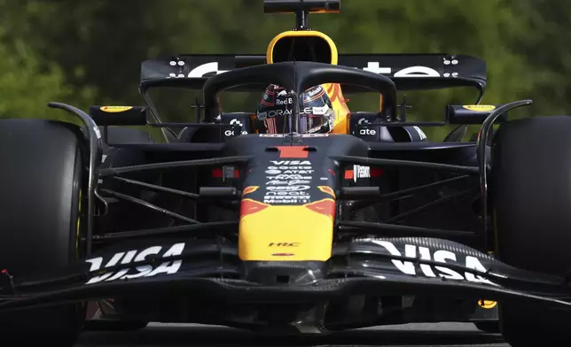 Red Bull driver Max Verstappen of the Netherlands steers his car during the sprint qualification ahead of the Formula One Grand Prix at the Spa-Francorchamps racetrack in Spa, Belgium, Friday, July 25, 2025. (Yves Herman, Pool Photo via AP)