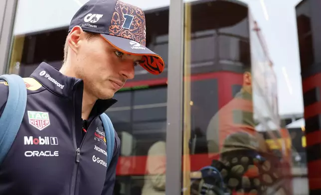 Red Bull driver Max Verstappen of the Netherlands arrives for the first practice session ahead of the Formula One Grand Prix at the Spa-Francorchamps racetrack in Spa, Belgium, Friday, July 25, 2025. (AP Photo/Geert Vanden Wijngaert)