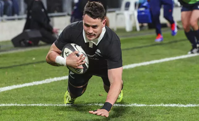 New Zealand's Will Jordan scores a trytheir rugby test against France in Dunedin, New Zealand, Saturday, July 5, 2025. (Marty Melville/Photosport via AP)