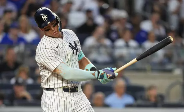 New York Yankees' Aaron Judge strikes out during the fifth inning of a baseball game against the Chicago Cubs, Friday, July 11, 2025, in New York. (AP Photo/Yuki Iwamura)