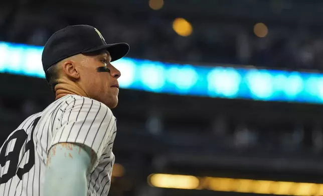 New York Yankees outfielder Aaron Judge walks onto the field during the eighth inning of a baseball game against the Chicago Cubs, Friday, July 11, 2025, in New York. (AP Photo/Yuki Iwamura)