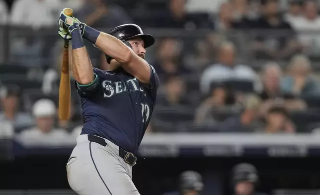 Seattle Mariners' Cal Raleigh (29) hits a home run during the eighth inning of a baseball game against the New York Yankees, Tuesday, July 8, 2025, in New York. (AP Photo/Yuki Iwamura)