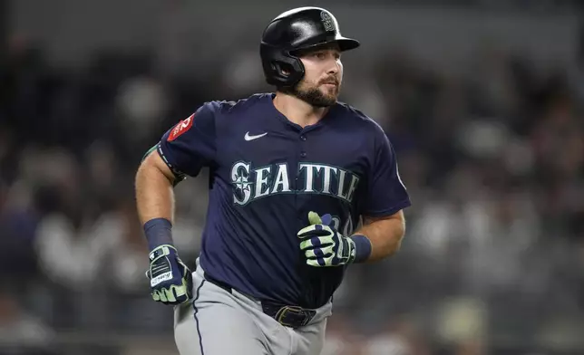 Seattle Mariners' Cal Raleigh (29) hits a home run during the eighth inning of a baseball game against the New York Yankees, Tuesday, July 8, 2025, in New York. (AP Photo/Yuki Iwamura)