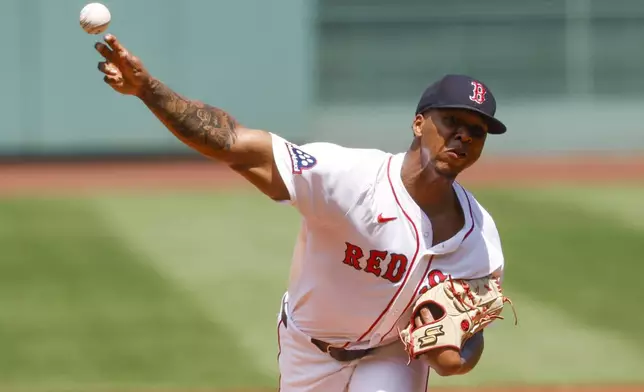 Boston Red Sox's Brayan Bello delivers a pitch in the first inning of a baseball game, Sunday, July 13, 2025, in Boston. (AP Photo/Greg M. Cooper)