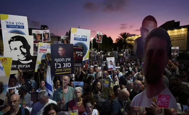 Relatives and supporters of Israeli hostages held in the Gaza Strip attend a rally demanding their release from Hamas captivity and calling for an end to the war, in Tel Aviv, Israel, Saturday, July 12, 2025. (AP Photo/Oded Balilty)