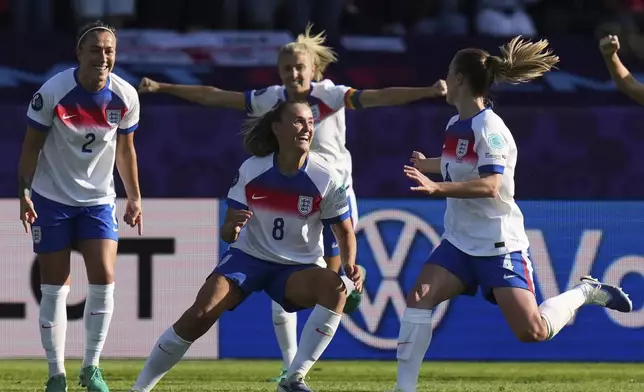 England's Georgia Stanway, center, celebrates after scoring her side's second goal during the Euro 2025, group D, soccer match between England and the Netherlands at Stadion Letzigrund in Zurich, Switzerland, Wednesday, July 9, 2025. (AP Photo/Alessandra Tarantino)