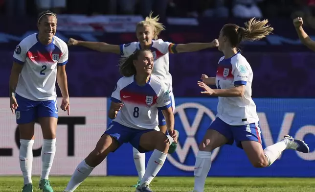 England's Georgia Stanway, center, celebrates after scoring her side's second goal during the Euro 2025, group D, soccer match between England and the Netherlands at Stadion Letzigrund in Zurich, Switzerland, Wednesday, July 9, 2025. (AP Photo/Alessandra Tarantino)