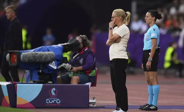 England head coach Sarina Wiegman stands by the touchline during the Euro 2025, group D, soccer match between England and the Netherlands at Stadion Letzigrund in Zurich, Switzerland, Wednesday, July 9, 2025. (AP Photo/Alessandra Tarantino)