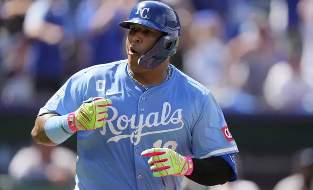 Kansas City Royals' Salvador Perez celebrates as he runs to first after hitting an RBI single to win the baseball game during the 10th inning against the Atlanta Braves, Wednesday, July 30, 2025, in Kansas City, Mo. (AP Photo/Charlie Riedel)