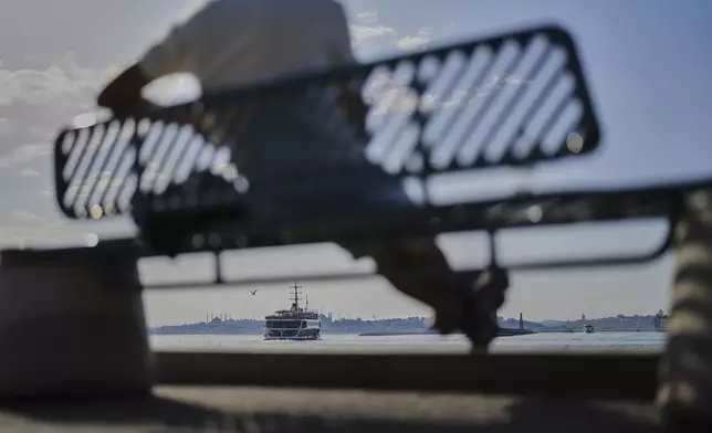 A ferry sails after departing from the Kadikoy terminal on the Asian side of Istanbul, Turkey, Thursday, May 22, 2025. (AP Photo/Francisco Seco)
