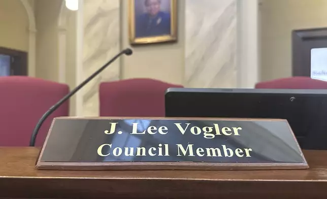 The name card for Danville Councilmember Lee Vogler where he works in Danville City Hall, Danville, Va., Wednesday, July 30, 2025. (AP Photo/Allen G. Breed)