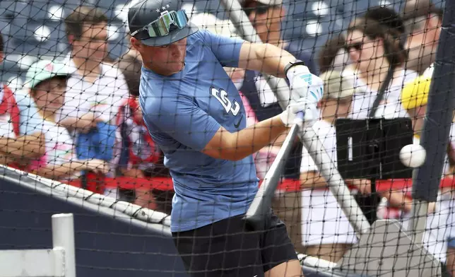 Washington Nationals first overall draft pick shortstop Eli Willits takes batting practice after an introductory news conference Saturday, July 19, 2025, in Washington. (AP Photo/Daniel Kucin Jr.)