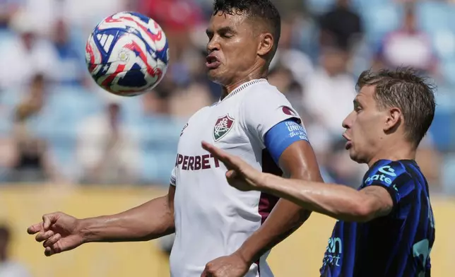 Fluminense's Thiago Silva, left, and Inter Milan's Nicolo Barella challenge for the ball during the Club World Cup round of 16 soccer match between Inter Milan and Fluminense in Charlotte, N.C., Monday, June 30, 2025. (AP Photo/Chris Carlson)
