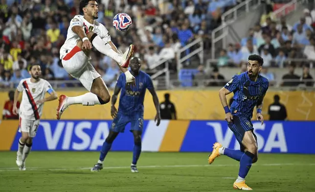 Manchester City's Omar Marmoush controls the ball during the Club World Cup round of 16 soccer match between Manchester City and Al Hilal in Orlando, Fla., Monday, June 30, 2025. (AP Photo/Phelan Ebenhack)