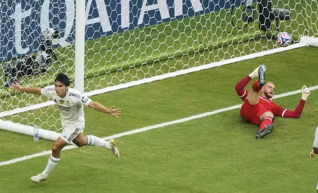 Real Madrid's Gonzalo Garcia (30) celebrates after scoring his side's opening goal during the Club World Cup round of 16 soccer match between Real Madrid and Juventus in Miami Gardens, Fla., Tuesday, July 1, 2025. (AP Photo/Marta Lavandier)