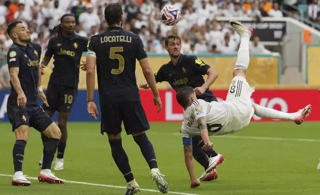 Real Madrid's Federico Valverde shoots during the Club World Cup round of 16 soccer match between Real Madrid and Juventus in Miami Gardens, Fla., Tuesday, July 1, 2025. (AP Photo/Rebecca Blackwell)