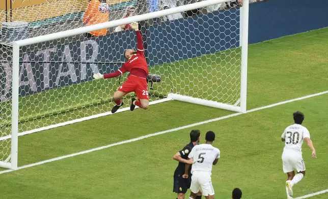 Real Madrid's Gonzalo Garcia (30) scores the opening goal during the Club World Cup round of 16 soccer match between Real Madrid and Juventus in Miami Gardens, Fla., Tuesday, July 1, 2025. (AP Photo/Marta Lavandier)