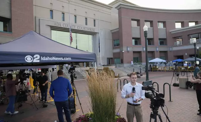 Members of the media stand outside the Ada County Courthouse for the Bryan Kohberger plea deal hearing on Wednesday, July 2, 2025, in Boise, Idaho. (AP Photo/Jenny Kane)