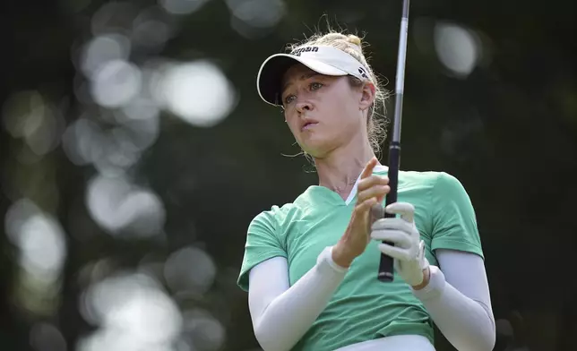 Nelly Korda, of USA, plays on the 2nd hole during the last round of the Evian Championship women's golf tournament, in Evian, eastern France, Sunday, July 13, 2025. (AP Photo/Laurent Cipriani)