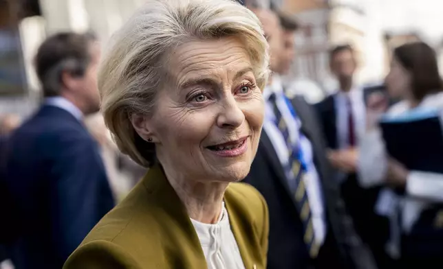 EU Commission President Ursula von der Leyen walks in the Town Hall Garden at Aarhus Town Hall, Aarhus, Denmark, Thursday, July 3, 2025. (Ida Marie Odgaard/Ritzau Scanpix via AP)
