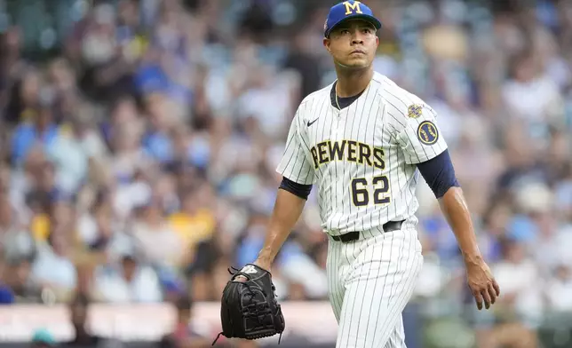 Milwaukee Brewers' Jose Quintana walks to the dugout during the fifth inning of a baseball game against the Miami Marlins, Saturday, July 26, 2025, in Milwaukee. (AP Photo/Aaron Gash)