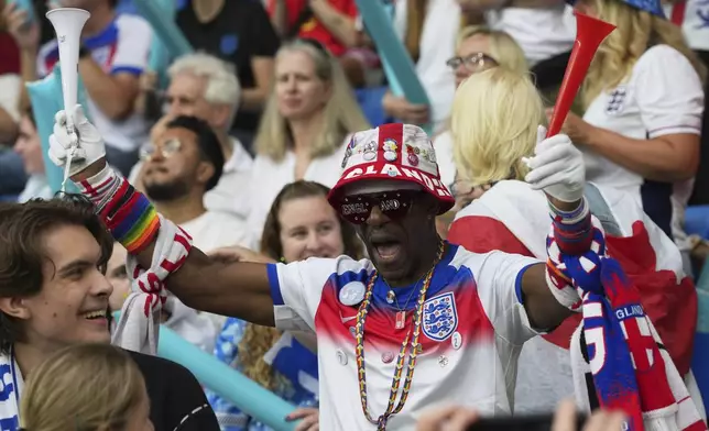 Fan cheers prior the Women's Euro 2025 final soccer match between England and Spain at St. Jakob-Park in Basel, Switzerland, Sunday, July 27, 2025. (AP Photo/Martin Meissner)