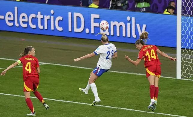 England's Alessia Russo, centre, scores her side's opening goal during the Women's Euro 2025 final soccer match between England and Spain at St. Jakob-Park in Basel, Switzerland, Sunday, July 27, 2025. (AP Photo/Michael Probst)
