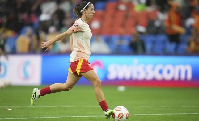 Spain's Aitana Bonmati runs with the ball during warmup before the Women's Euro 2025 final soccer match between England and Spain at St. Jakob-Park in Basel, Switzerland, Sunday, July 27, 2025. (AP Photo/Alessandra Tarantino)