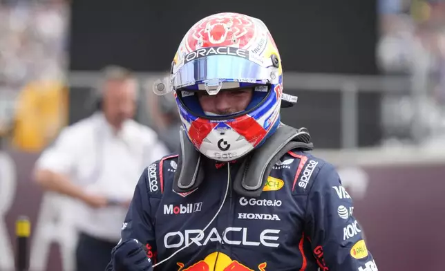 Red Bull driver Max Verstappen of the Netherlands celebrates his pole position after the qualifying session at the Silverstone racetrack, ahead of the British Formula One Grand Prix, in Silverstone, England, Saturday, July 5, 2025. (AP Photo/Darko Bandic)