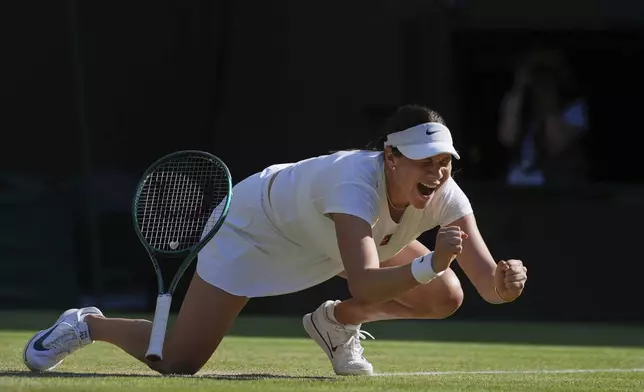 Amanda Anisimova of the U.S. celebrates winning the women's singles quarter finals match against Anastasia Pavlyuchenkova of Russia at the Wimbledon Tennis Championships in London, Tuesday, July 8, 2025.(AP Photo/Kin Cheung)