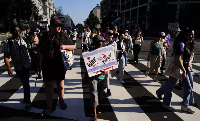 Demonstrators protest Israeli Prime Minister Benjamin Netanyahu's visit to Washington, Monday, July 7, 2025, near the White House. (AP Photo/Julia Demaree Nikhinson)