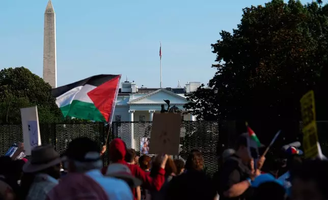 The White House is seen as demonstrators protest Israeli Prime Minister Benjamin Netanyahu's visit to Washington, Monday, July 7, 2025. (AP Photo/Julia Demaree Nikhinson)
