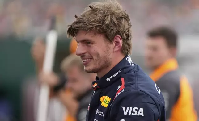Red Bull driver Max Verstappen of the Netherlands smiles after taking the pole position during the qualifying for the British Formula One Grand Prix in Silverstone, England, Saturday, July 5, 2025. (AP Photo/Darko Bandic)