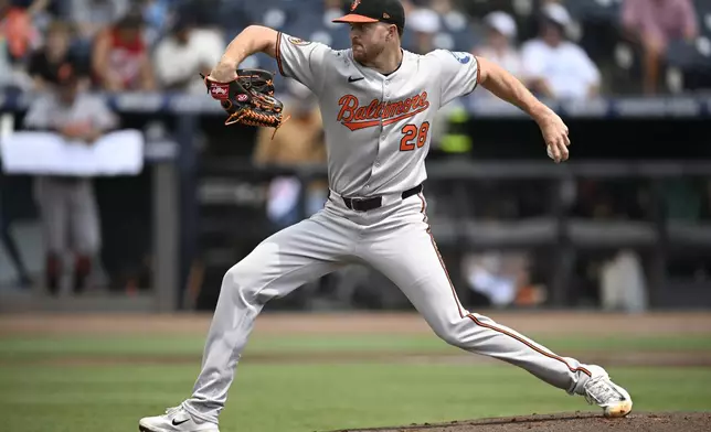 Baltimore Orioles starting pitcher Trevor Rogers throws to home plate during the first inning of a baseball game against the Tampa Bay Rays, Sunday, July 20, 2025, in Tampa, Fla. (AP Photo/Phelan M. Ebenhack)