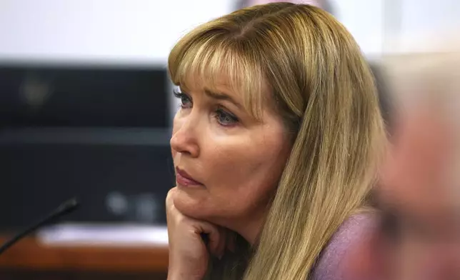 Minnesota state Sen. Nicole Mitchell, D-Woodbury, listens to closing arguments during the fifth day of her felony burglary trial, Friday, July 18, 2025, at Becker County District Court in Detroit Lakes, Minn. (Anna Paige/The Forum via AP, Pool)