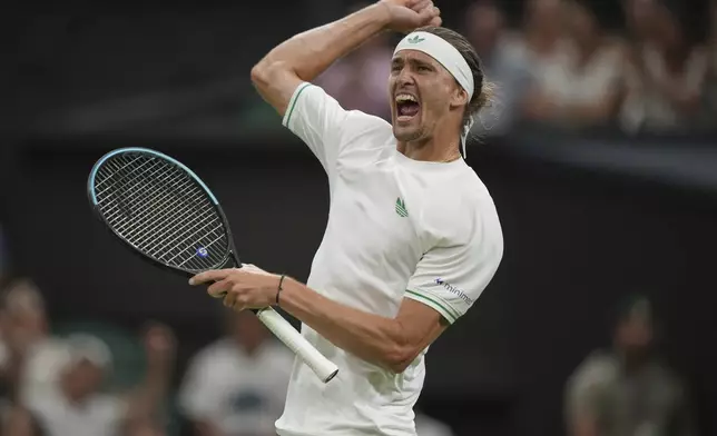 Alexander Zverev of Germany reacts after the second set against Arthur Rinderknech of France in their first round men's singles match at the Wimbledon Tennis Championships in London, Monday, June 30, 2025. (AP Photo/Alastair Grant)