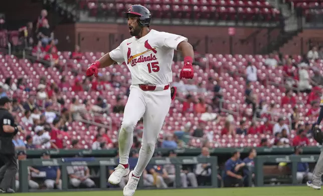 St. Louis Cardinals' Jose Fermin celebrates after hitting a two-run home run during the sixth inning of a baseball game against the Atlanta Braves Sunday, July 13, 2025, in St. Louis. (AP Photo/Jeff Roberson)