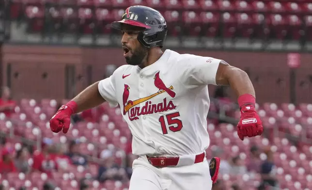 St. Louis Cardinals' Jose Fermin celebrates after hitting a two-run home run during the sixth inning of a baseball game against the Atlanta Braves Sunday, July 13, 2025, in St. Louis. (AP Photo/Jeff Roberson)