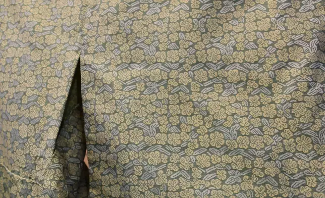 This shows the Nishijinori fabric for which AI came up with the design at the Fukuoka Weaving in Kyoto, western Japan on July 3, 2025. (AP Photo/Yuri Kageyama)