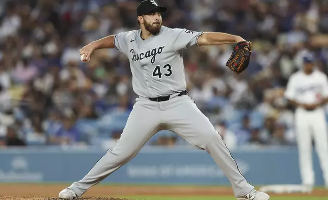Chicago White Sox pitcher Aaron Civale throws to a Los Angeles Dodgers batter during the fourth inning of a baseball game, Thursday, July 3, 2025, in Los Angeles. (AP Photo/Jessie Alcheh)