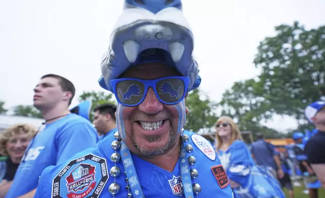 Robert Gonzales, of Monroe, poses for a portrait during Back Together Weekend at NFL football training camp Saturday, July 26, 2025, in Allen Park, Mich. (AP Photo/Ryan Sun)