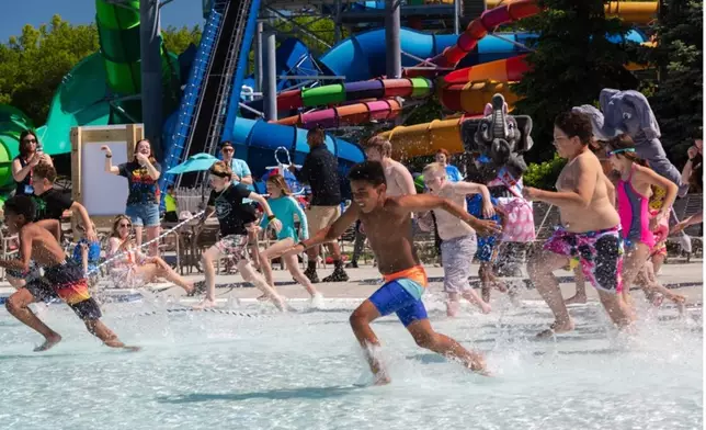 Families race to compete in friendly competition during National Waterpark Day at Kalahari Resort.